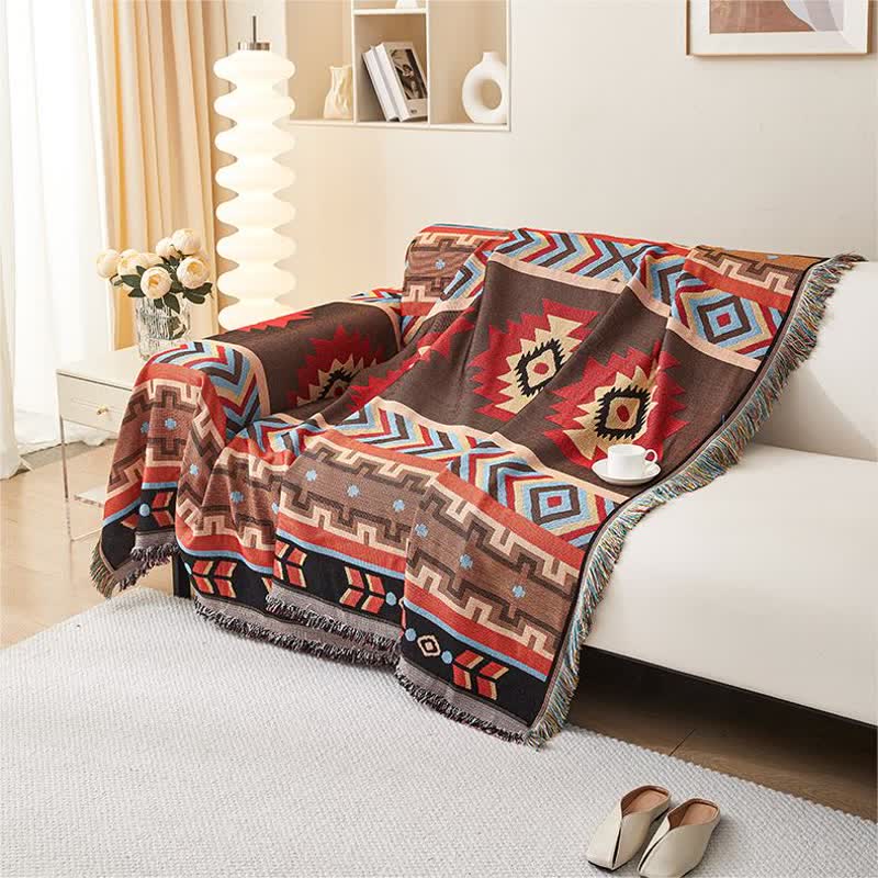 Geometric sofa cover with tassels