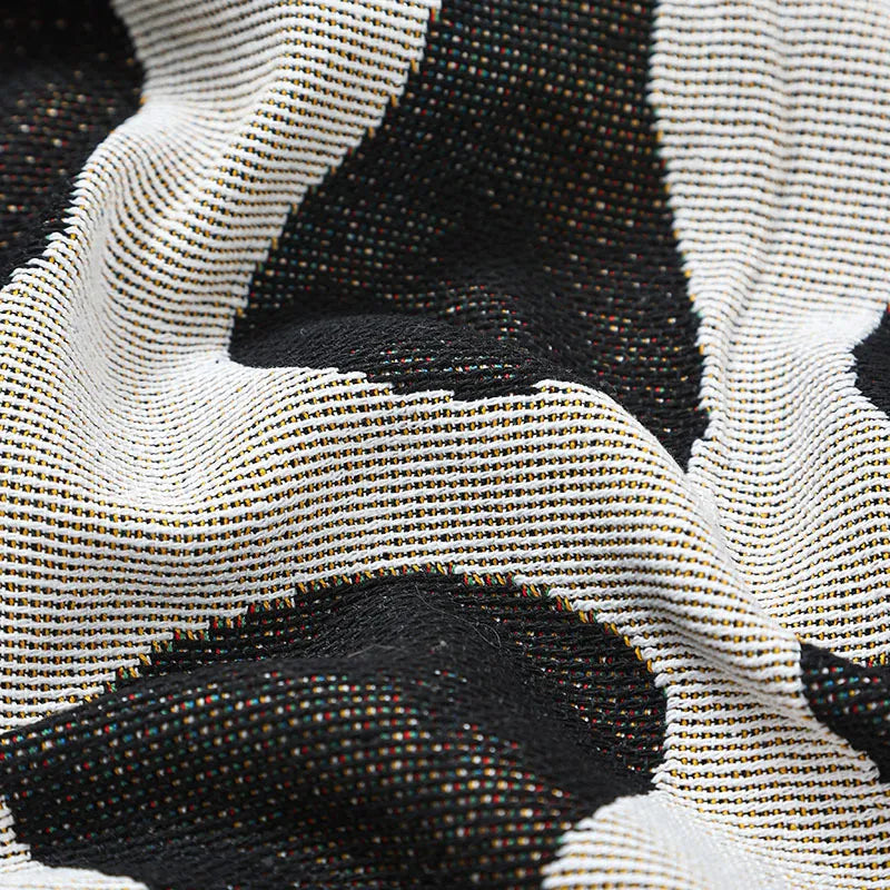 Retro knitted blanket in a vine design