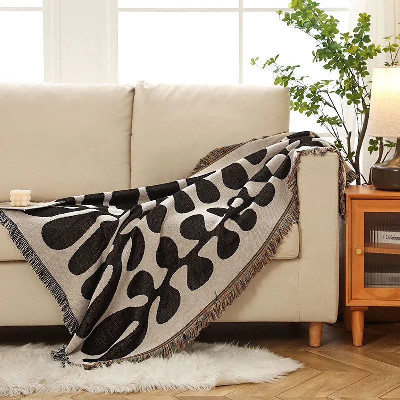 Retro knitted blanket in a vine design