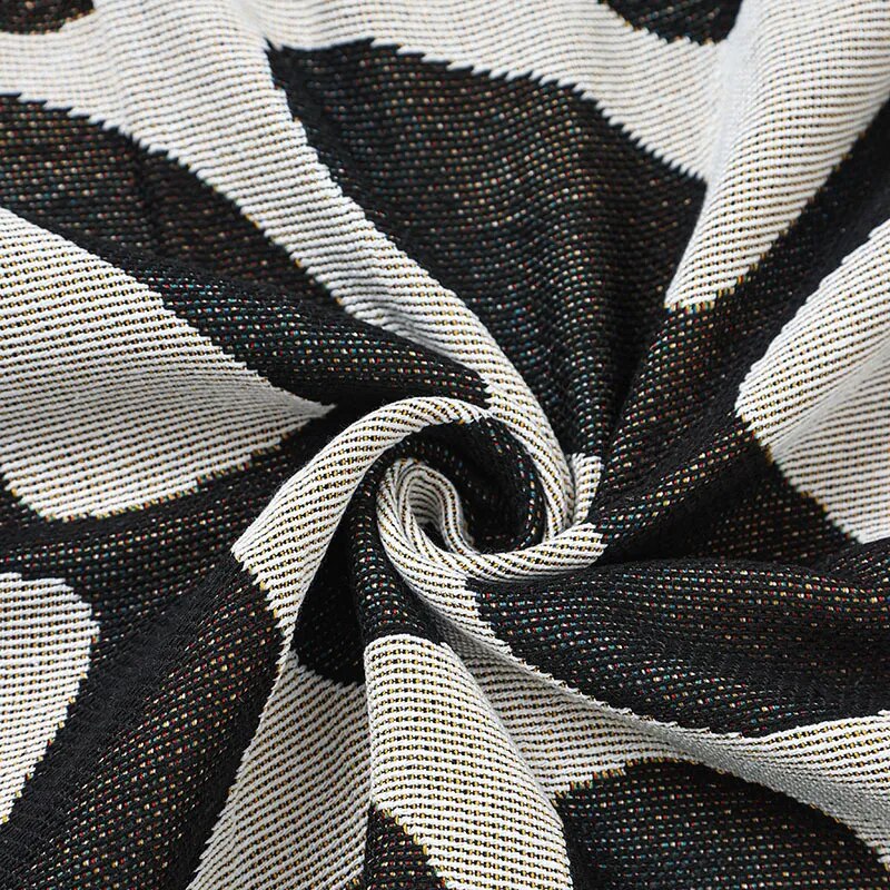 Retro knitted blanket in a vine design