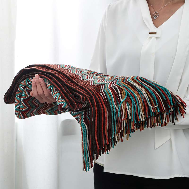 Colorful striped throw blanket with tassels