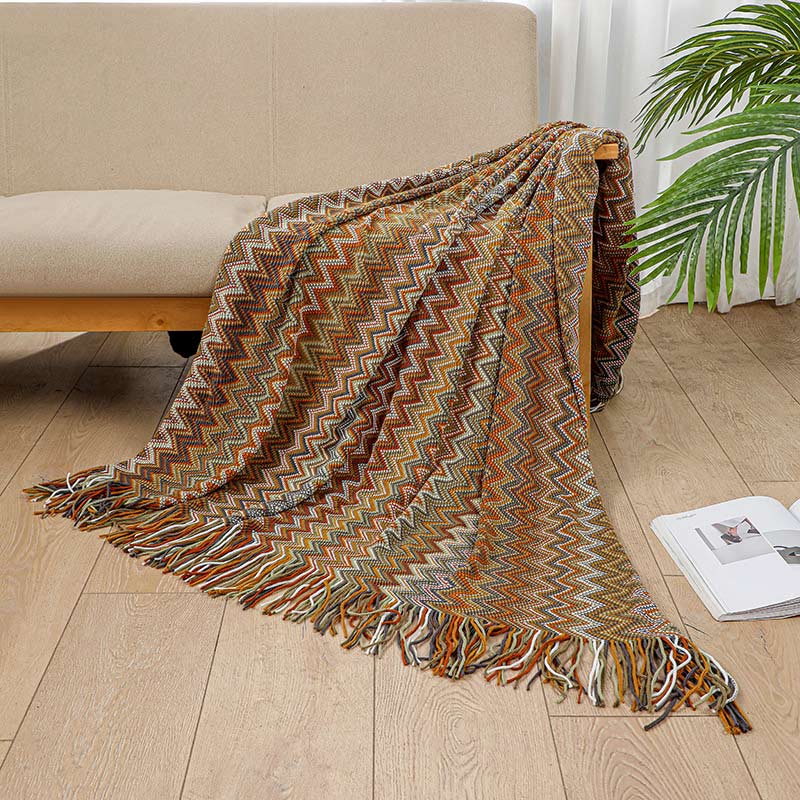 Colorful striped throw blanket with tassels
