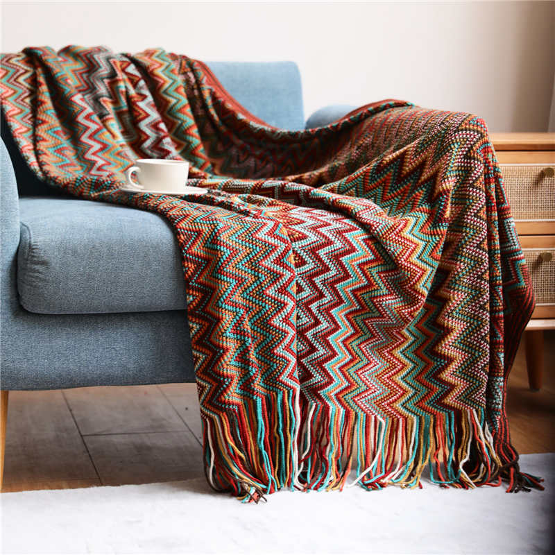 Colorful striped throw blanket with tassels