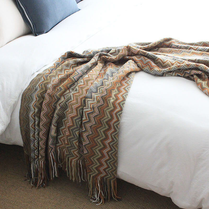 Colorful striped throw blanket with tassels