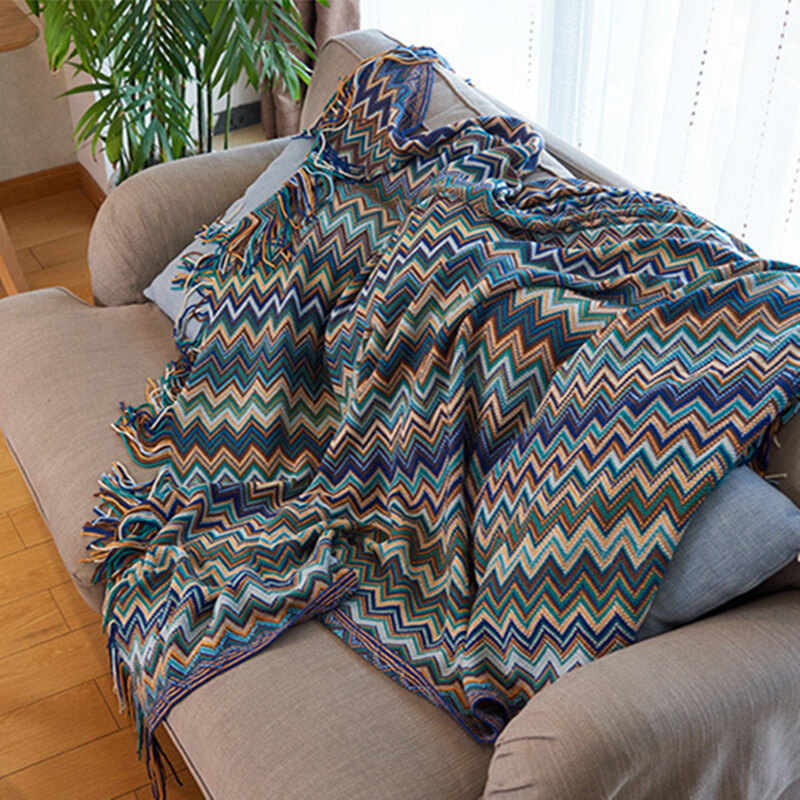 Colorful striped throw blanket with tassels