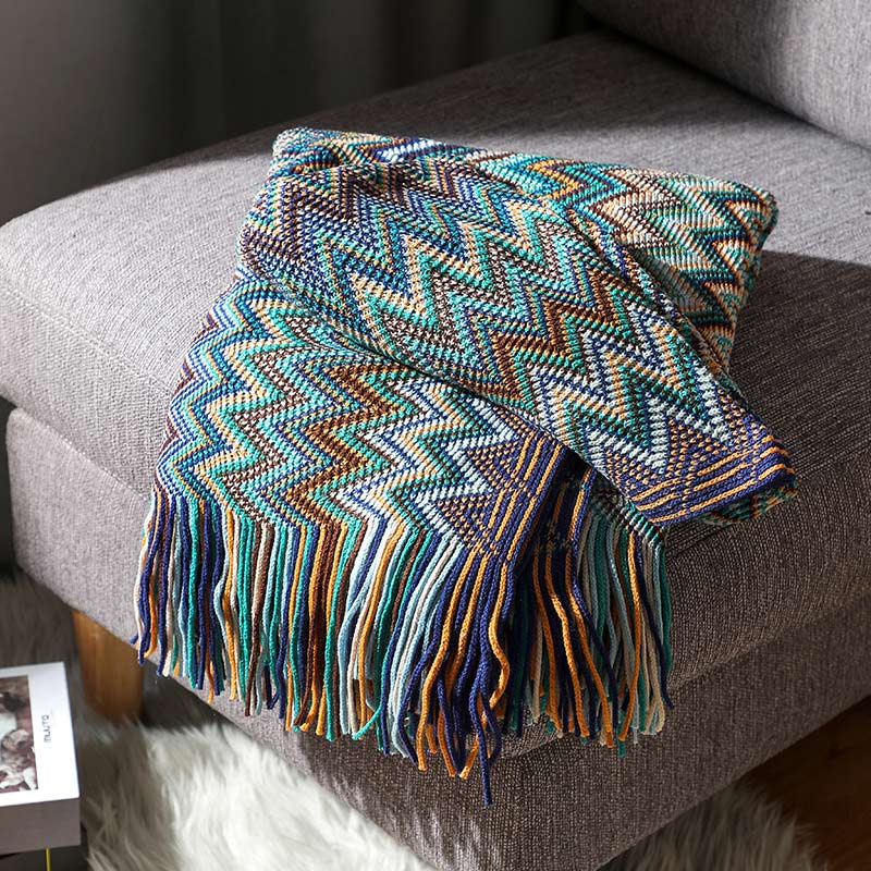 Colorful striped throw blanket with tassels