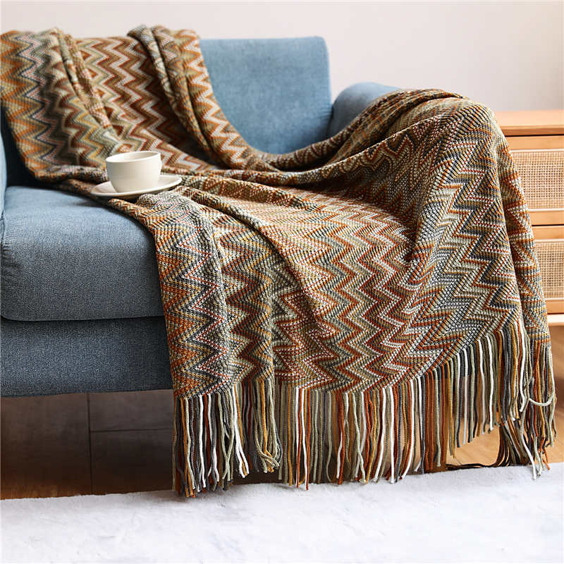 Colorful striped throw blanket with tassels