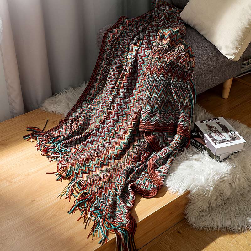 Colorful striped throw blanket with tassels