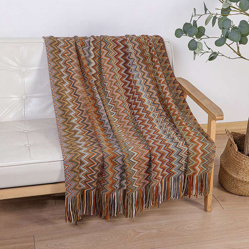 Colorful striped throw blanket with tassels
