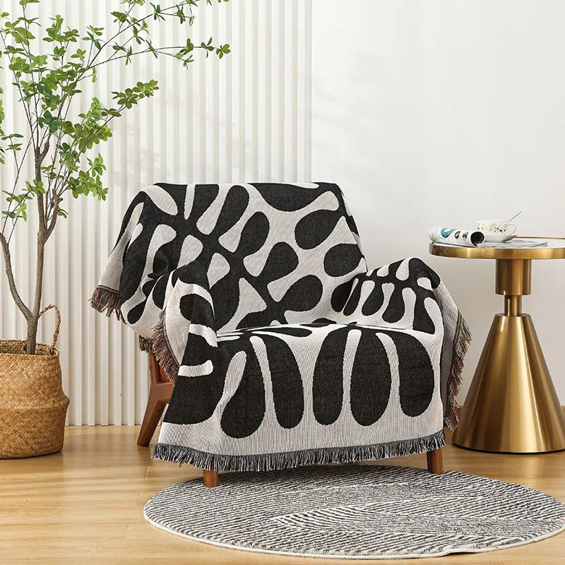 Retro knitted blanket in a vine design