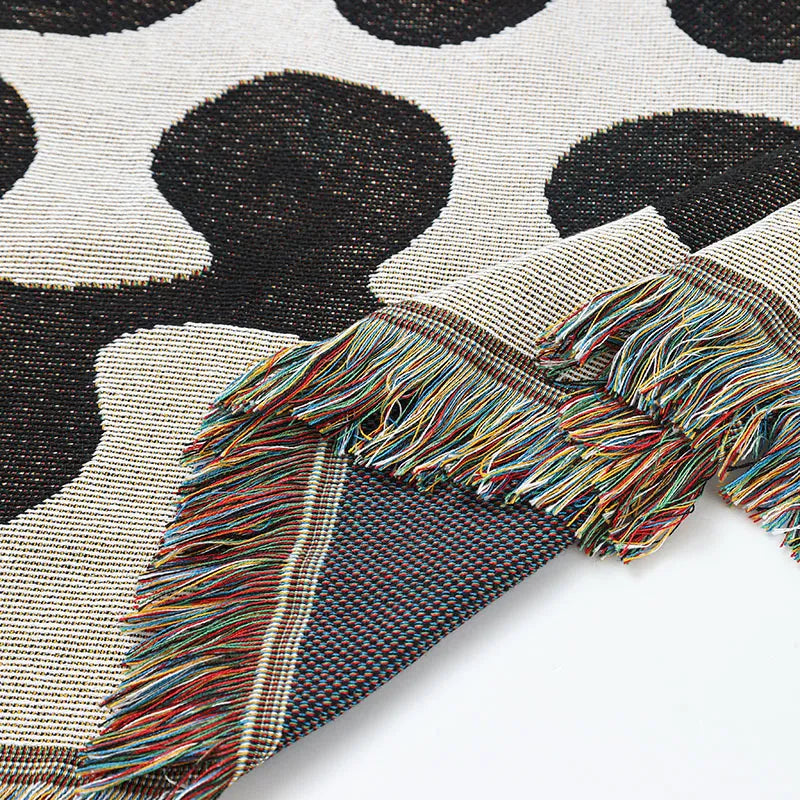 Retro knitted blanket in a vine design