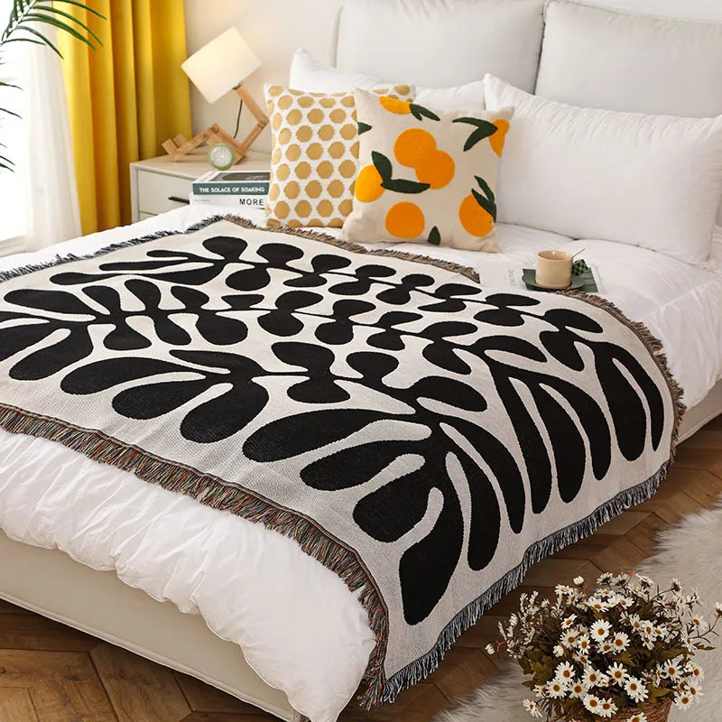 Retro knitted blanket in a vine design