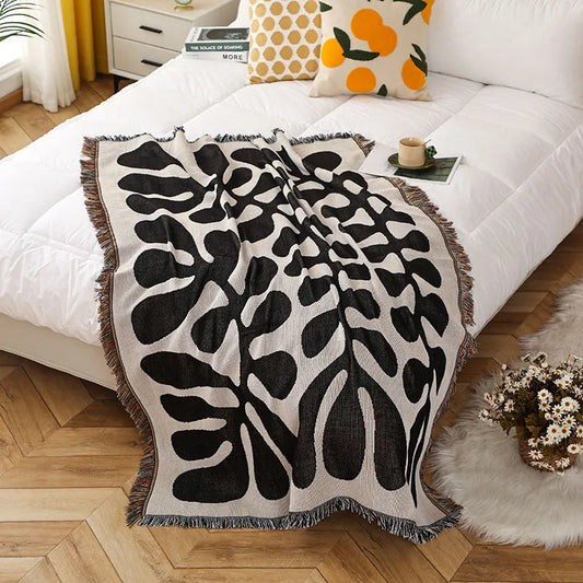 Retro knitted blanket in a vine design