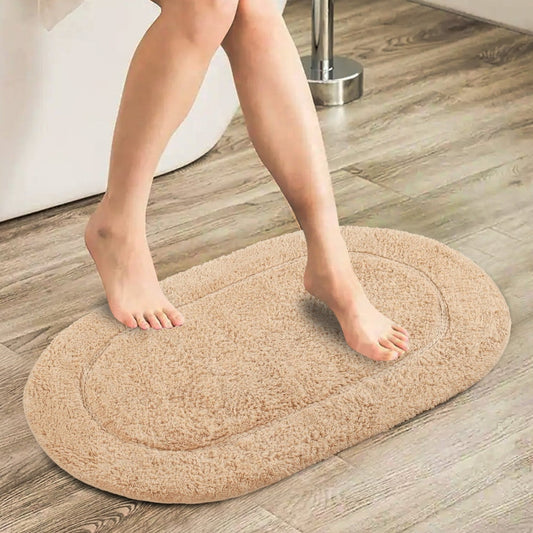 https://cdn.shopify.com/s/files/1/0637/4480/2863/files/SnugStep_Oval_Bath_Mat_15.jpg?v=1748518411
