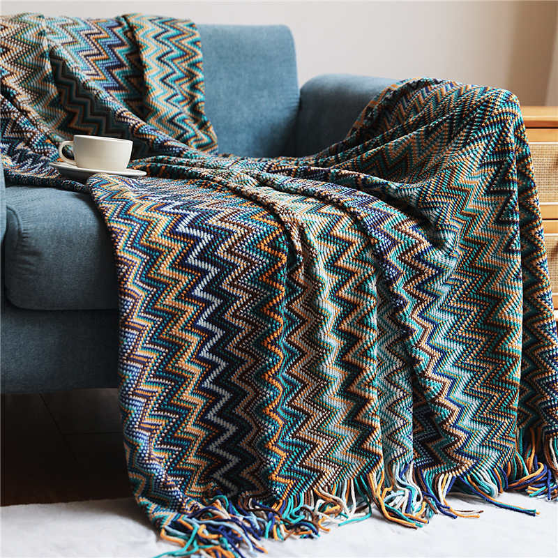 Colorful striped throw blanket with tassels