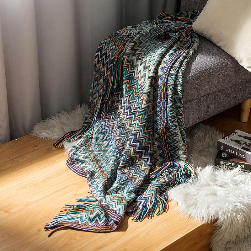 Colorful striped throw blanket with tassels