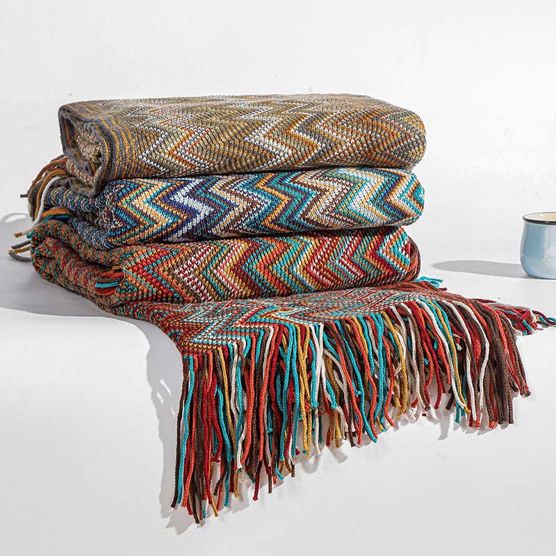Colorful striped throw blanket with tassels
