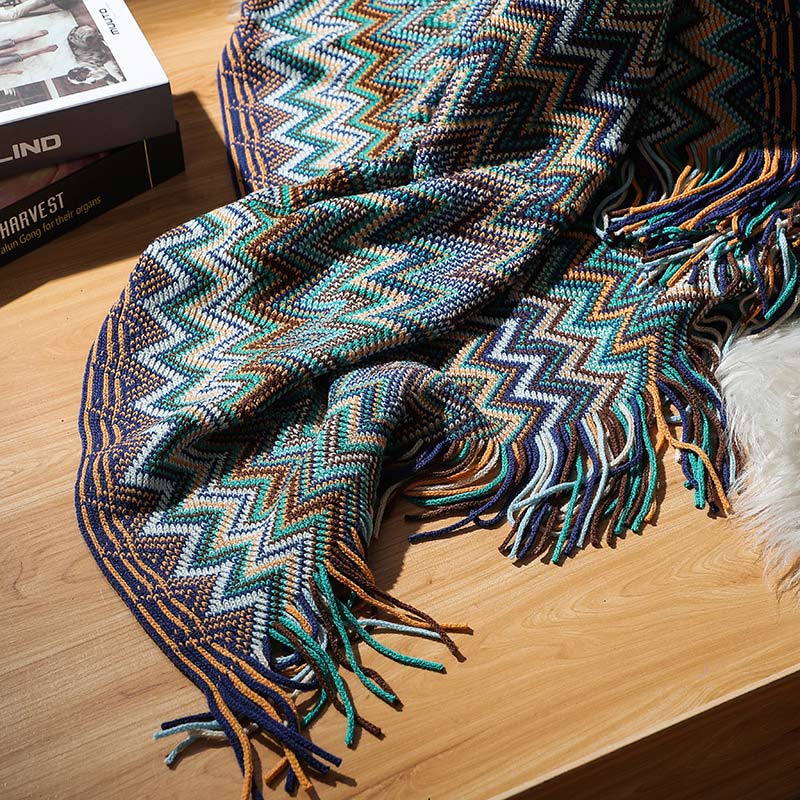 Colorful striped throw blanket with tassels