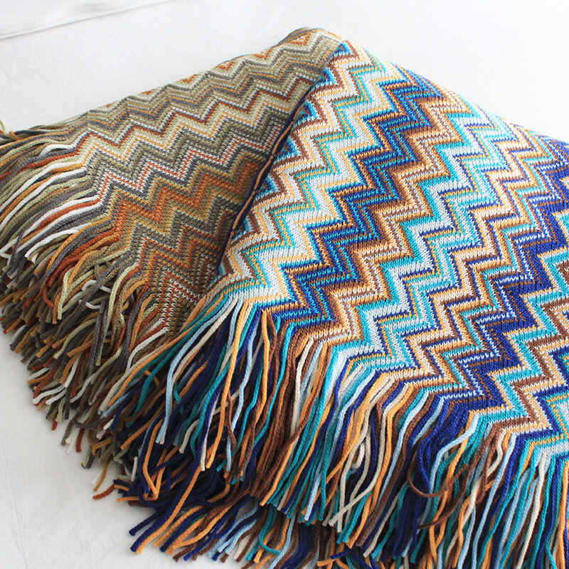 Colorful striped throw blanket with tassels