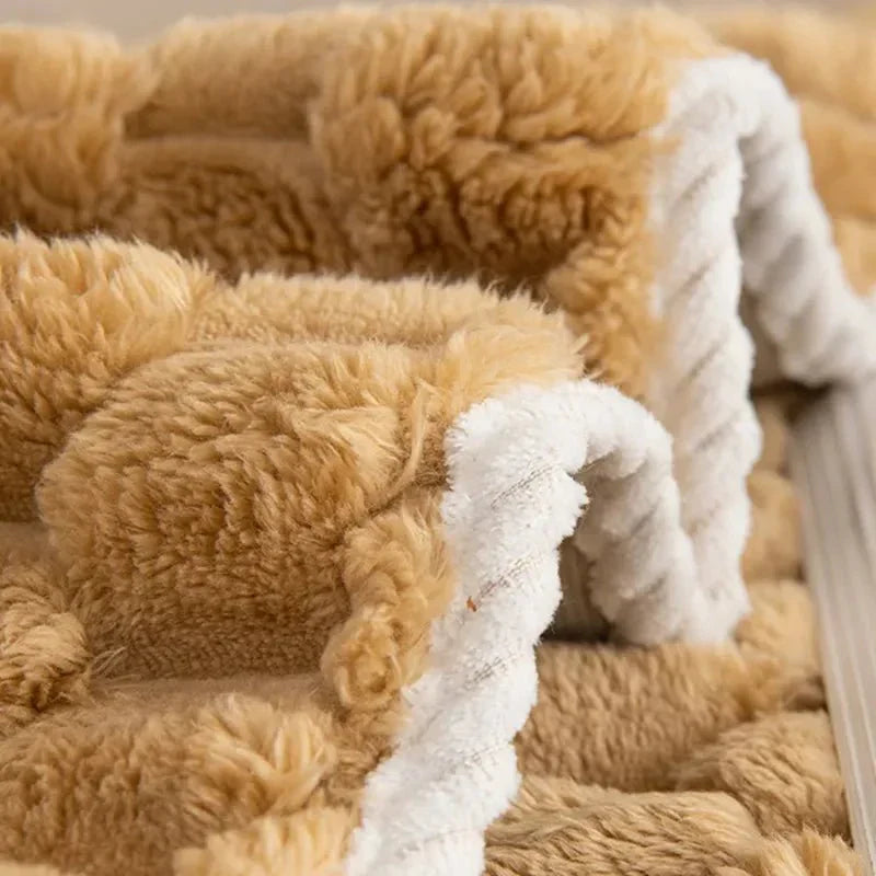Plush sofa blanket in pastel colors