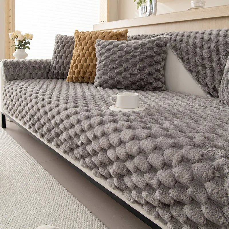 Plush sofa blanket in pastel colors