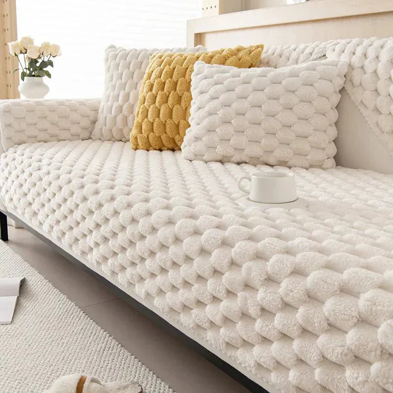 Plush sofa blanket in pastel colors