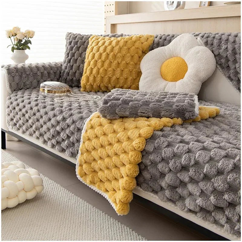 Plush sofa blanket in pastel colors
