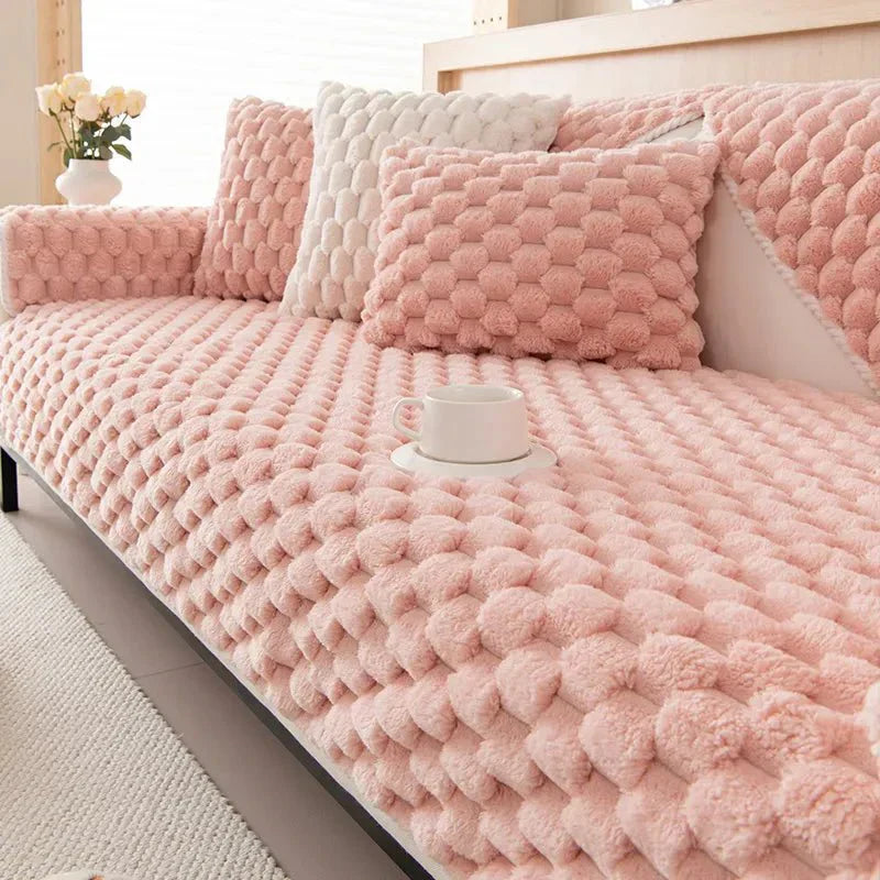 Plush sofa blanket in pastel colors